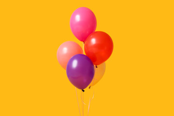 Air balloons on orange background