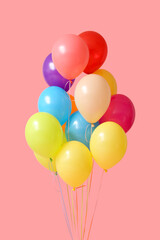 Air balloons on pink background