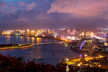 Naklejka premium The night view of Sanya Bay in Sanya City, Hainan Province, China