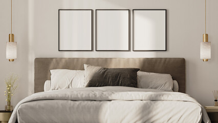 Three empty frames mock up above the bed in modern bedroom interior, front view, 3d render