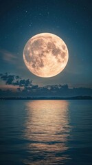Giant full moon rising above the calm ocean night sky reflection.