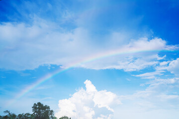 Peaceful Rainbow Over a Summer Sky