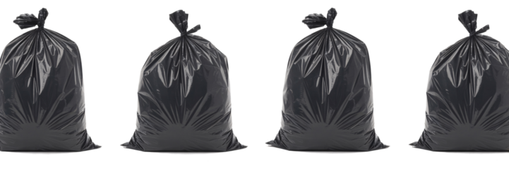 Four Black Plastic Garbage Bags Studio Shot Ready for Waste Disposal or Recycling Concept