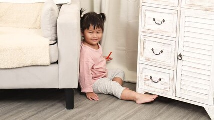 Young daughter playing hide and seek behind curtain, expressing childhood fun, bonding, homeschool, education, parenting, lifestyle, happiness, affection, imagination, preschool learning, family.