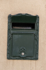 Vintage British style old mailbox on the wall in Neve Tzedek, Tel Aviv, Israel