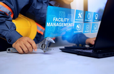Facility management concept with technician prepare equipment in front of computer screen to ready...