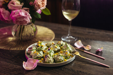romantic dinner with flowers in the kitchen