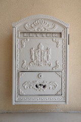 Vintage British style old mailbox on the wall in Neve Tzedek, Tel Aviv, Israel