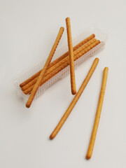 Long biscuit or sweet crackers stick on white background