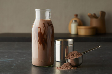 chocolate protein smoothie and shaker, protein powder supplement presentation