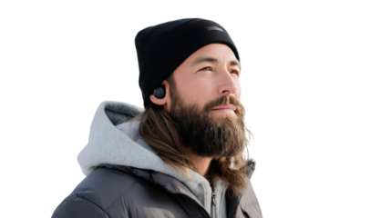 Serene Contemplation: A man is captured in a moment of tranquil thought, wearing a beanie and earbuds, gazing up towards the sky, enveloped in a peaceful scene.