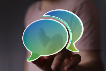 Abstract image of two vibrant speech bubbles, symbolizing conversation and communication.
