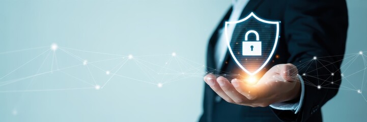 Person holding a digital shield with a lock graphic.