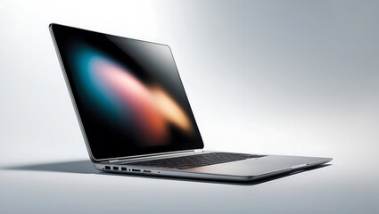 Modern laptop computer on a bright reflective surface showcasing cutting edge technology design