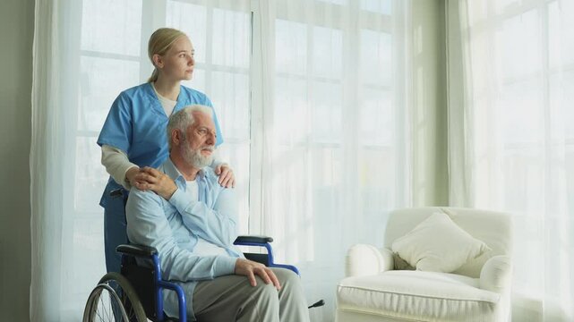 Help support retirement healthcare. Nurse helping old man in wheelchair. Patient and woman in nursing home for medical caregiver. Nurse taking care of paralyzed man in chair for people with disability