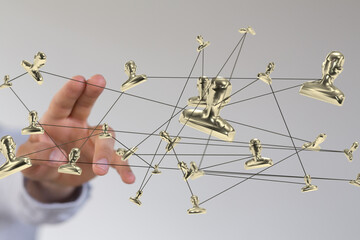 Illustrative image depicting a network of golden figures, symbolizing global connections, teamwork,...