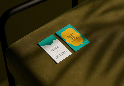 Business Card Mockup &ndash; Stylish Vertical Layout with Bold Colors and Shadow Play on Olive Bench Scene