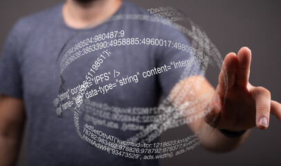A programmer interacts with a 3D holographic display showing code. Software development, technology...