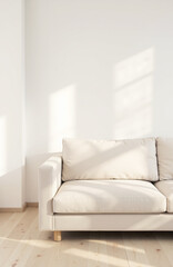 Minimalist beige couch against white wall, soft natural light.