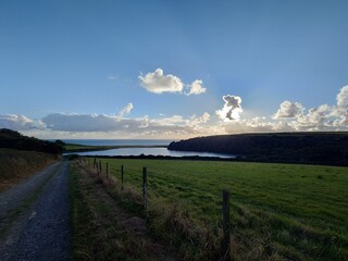 path by a lake 