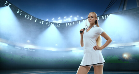 Woman tennis player playing tennis on professional tennis stadium in night.