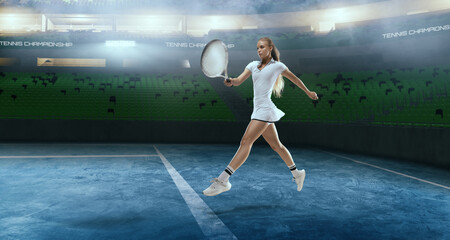 Woman tennis player playing tennis on professional tennis stadium in night.
