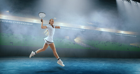 Woman tennis player playing tennis on professional tennis stadium in night.