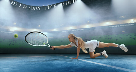 Woman tennis player playing tennis on professional tennis stadium in night.