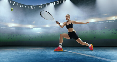 Woman tennis player playing tennis on professional tennis stadium in night.