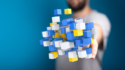 Abstract image of a man presenting a data network concept with colorful cubes.