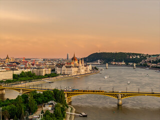 Scenic view of the famous Margit bridge acrossing over Danube river. Hungarian Parliament amazing building visible too in the photo