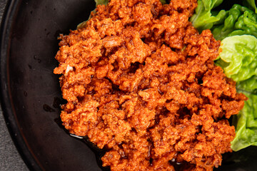 Tuna tomato sauce canned fish seafood fresh delicious gourmet food background on the table rustic food top view copy space keto and paleo diet vegan food pescetarian diet