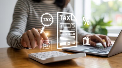 Person interacting with a digital tax document on a computer.