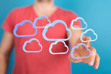 Person using cloud technology, digital transformation, data storage, networking.