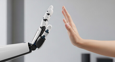 Human hand and robotic hand reaching towards each other