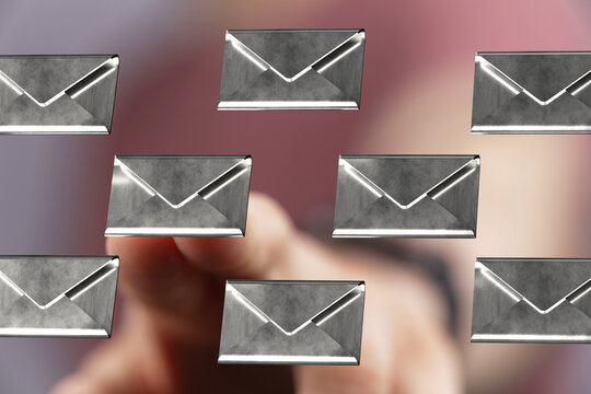 Close-up of finger interacting with digital email icons.  Modern communication and inbox management. - Powered by Adobe