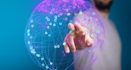Person interacts with a digital global network, showcasing connectivity and data visualization.