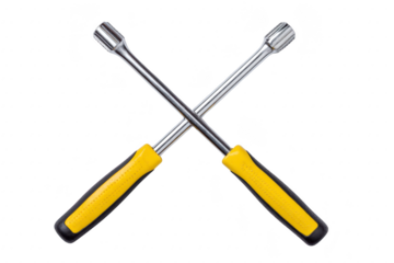 Two crossed socket wrenches with yellow handles are displayed against transparency background, showcasing their shiny metal finish and ergonomic grip