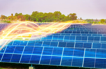 Rows of solar panels in a green field under clear skies with digital energy flow effects,...