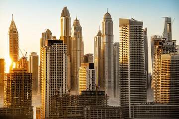 skyscrapers of the dubai marina during sunrise