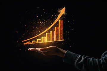 Hand holding glowing bar graph showing growth