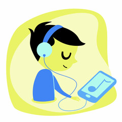 Boy listening to music on tablet headphones enjoying audio