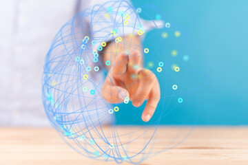 Hand reaching towards a digital network.  Concept of connection, technology, and global...