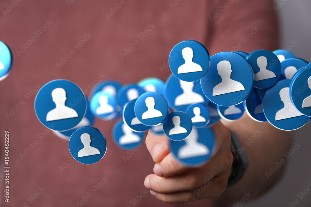 Aufkleber image of hand interacting with floating social media profile icons, representing online networking, 