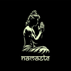 vector silhouette of a person in yoga namaste position