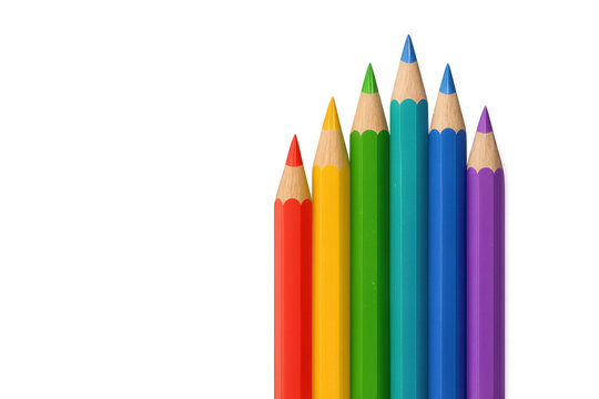 Colorful sharpened pencils standing vertically, displaying rainbow hues on clear surface, symbolizing artistic potential and creative diversity