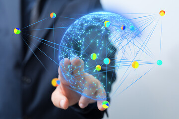 Image of a hand holding a digital globe, illustrating global connectivity and networking.