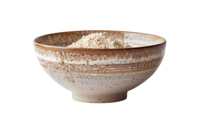 Rustic ceramic bowl filled with fine whole wheat flour, featuring earthy tones and textured edges on a transparent background