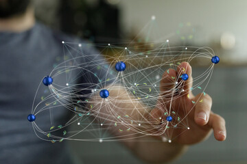 Hand interacting with a digital network, illustrating connection and global communication.
