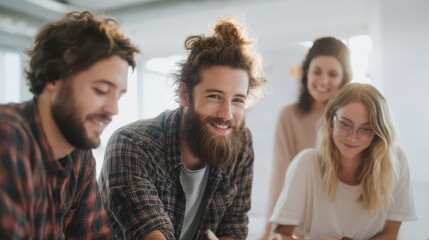 Fototapeta premium Creative Team Collaborating in a Bright Modern Workspace